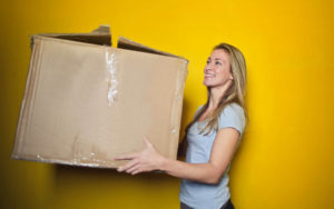 Woman holding storage box